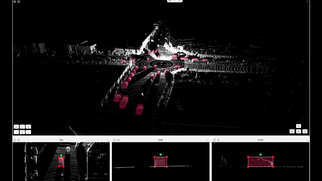 LiDAR point cloud of a street intersection in an annotation tool, with vehicles in 3D cuboids.